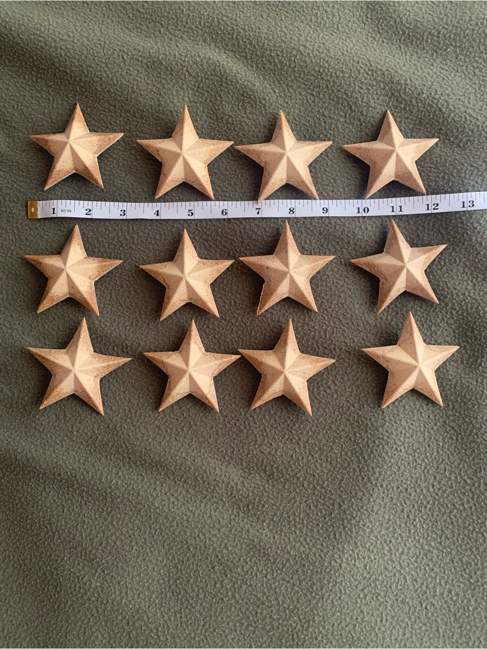 Lot of 12 Dimensional stars for decor or crafts. Approximately 3”.